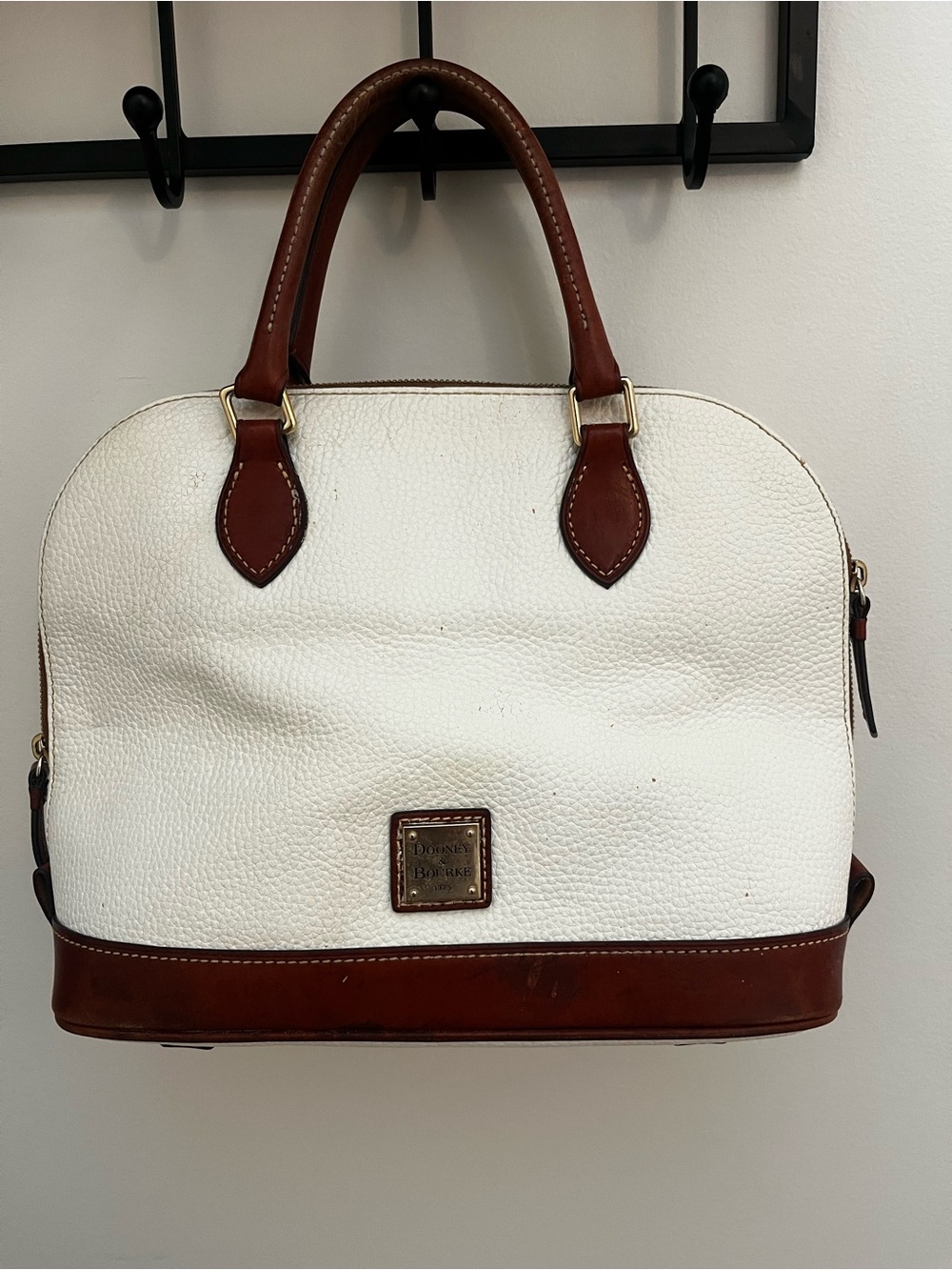 Dooney & Bourke White Pebbled Leather Tote with Brown Trim and Gold Plaque